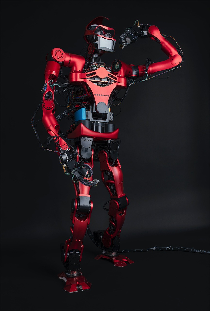 Technology innovation - robotic hand in futuristic blue lighting